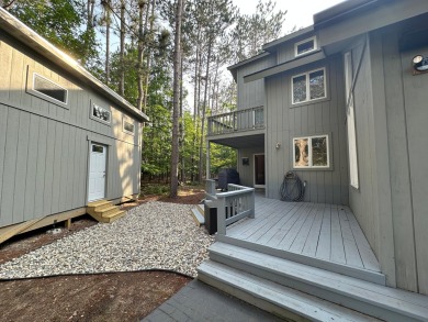 Beautiful golf course home on 2.4 acres overlooking the 6th on Michaywe Pines Course in Michigan - for sale on GolfHomes.com, golf home, golf lot