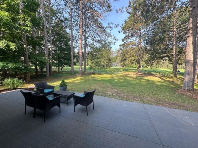 Beautiful golf course home on 2.4 acres overlooking the 6th on Michaywe Pines Course in Michigan - for sale on GolfHomes.com, golf home, golf lot