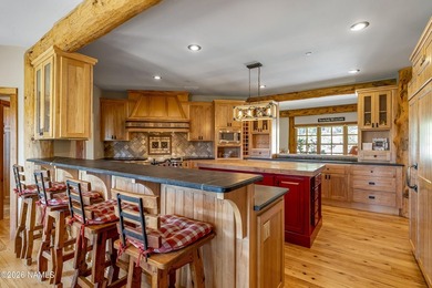 Welcome to the Casa de Madera e Piedra (The House of Wood and on Flagstaff Ranch Golf Club in Arizona - for sale on GolfHomes.com, golf home, golf lot