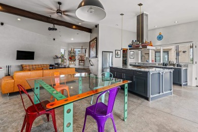 Live inside a work of art in this  Artist's Dream Dwelling in on Taos Country Club in New Mexico - for sale on GolfHomes.com, golf home, golf lot
