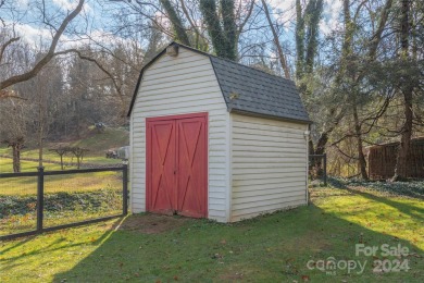 This stunning creekside 5 bedroom, 2.5 bath right off Lake on Lake Junaluska Golf Course in North Carolina - for sale on GolfHomes.com, golf home, golf lot