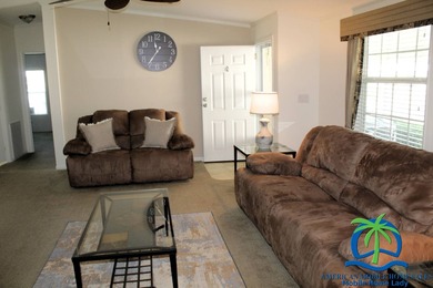 This well-maintained 2014 Nobility Lindsay, owned and occupied on Cypresswood Golf and Country Club in Florida - for sale on GolfHomes.com, golf home, golf lot