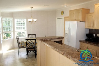 This well-maintained 2014 Nobility Lindsay, owned and occupied on Cypresswood Golf and Country Club in Florida - for sale on GolfHomes.com, golf home, golf lot