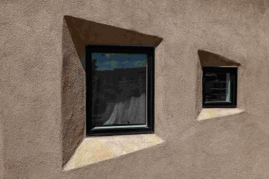 Live inside a work of art in this  Artist's Dream Dwelling in on Taos Country Club in New Mexico - for sale on GolfHomes.com, golf home, golf lot