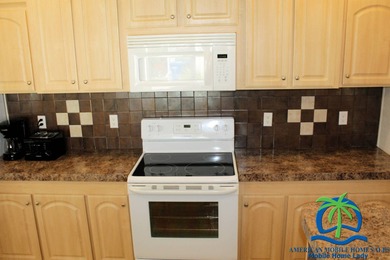 This well-maintained 2014 Nobility Lindsay, owned and occupied on Cypresswood Golf and Country Club in Florida - for sale on GolfHomes.com, golf home, golf lot