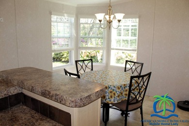 This well-maintained 2014 Nobility Lindsay, owned and occupied on Cypresswood Golf and Country Club in Florida - for sale on GolfHomes.com, golf home, golf lot