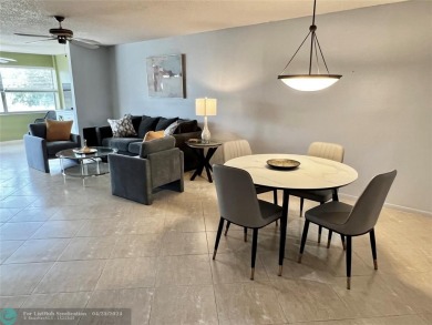 Updated & well kept 2 bedroom / 2 bath condo in highly desirable on Sunrise Lakes Phase III in Florida - for sale on GolfHomes.com, golf home, golf lot
