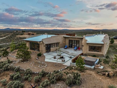 Live inside a work of art in this Artist's Dream Dwelling in on Taos Country Club in New Mexico - for sale on GolfHomes.com, golf home, golf lot