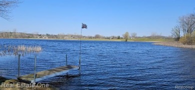 LOCATION, Location, Location!! Nestled on just over 3/4's of an on Indianwood Golf and Country Club in Michigan - for sale on GolfHomes.com, golf home, golf lot