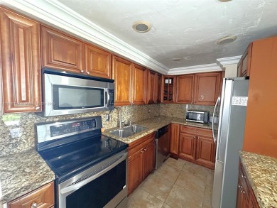 Welcome to the prestigious Country Club of Miami.   Rarely on Country Club of Miami in Florida - for sale on GolfHomes.com, golf home, golf lot