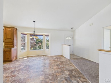 Experience the best of Pueblo West living in this spacious on Desert Hawk At Pueblo West in Colorado - for sale on GolfHomes.com, golf home, golf lot