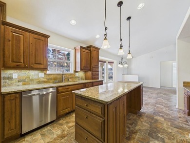 Experience the best of Pueblo West living in this spacious on Desert Hawk At Pueblo West in Colorado - for sale on GolfHomes.com, golf home, golf lot