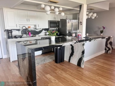 Newly Renovated

Updated Kitchen: Sleek black-and-white on Crystal Lake Country Club in Florida - for sale on GolfHomes.com, golf home, golf lot