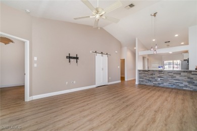 Motivated Seller!  END-UNIT, SINGLE LEVEL, CANAL FRONT, DIRECT on Saint Andrews South Golf Club in Florida - for sale on GolfHomes.com, golf home, golf lot
