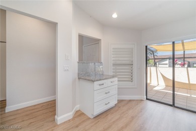 Motivated Seller!  END-UNIT, SINGLE LEVEL, CANAL FRONT, DIRECT on Saint Andrews South Golf Club in Florida - for sale on GolfHomes.com, golf home, golf lot