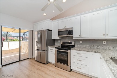 Motivated Seller!  END-UNIT, SINGLE LEVEL, CANAL FRONT, DIRECT on Saint Andrews South Golf Club in Florida - for sale on GolfHomes.com, golf home, golf lot