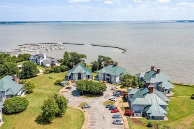 Enjoy breathtaking views of the James River from this on Kingsmill Resort and Golf Club in Virginia - for sale on GolfHomes.com, golf home, golf lot