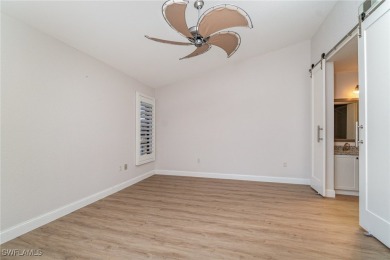 Motivated Seller!  END-UNIT, SINGLE LEVEL, CANAL FRONT, DIRECT on Saint Andrews South Golf Club in Florida - for sale on GolfHomes.com, golf home, golf lot