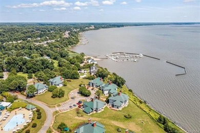 Enjoy breathtaking views of the James River from this on Kingsmill Resort and Golf Club in Virginia - for sale on GolfHomes.com, golf home, golf lot