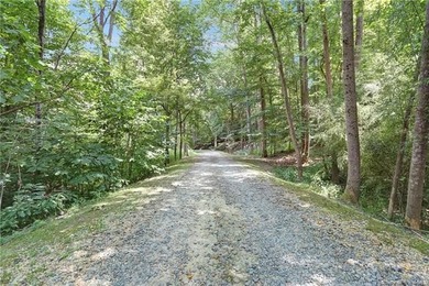 Enjoy breathtaking views of the James River from this on Kingsmill Resort and Golf Club in Virginia - for sale on GolfHomes.com, golf home, golf lot