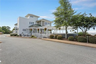 Enjoy breathtaking views of the James River from this on Kingsmill Resort and Golf Club in Virginia - for sale on GolfHomes.com, golf home, golf lot