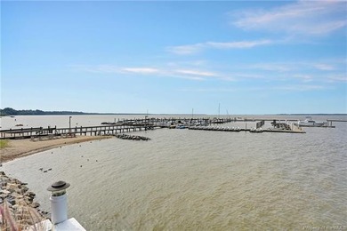 Enjoy breathtaking views of the James River from this on Kingsmill Resort and Golf Club in Virginia - for sale on GolfHomes.com, golf home, golf lot