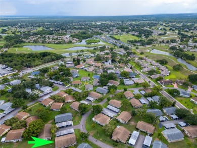 One or more photo(s) has been virtually staged. This home was on Kings Point Executive Golf Course in Florida - for sale on GolfHomes.com, golf home, golf lot