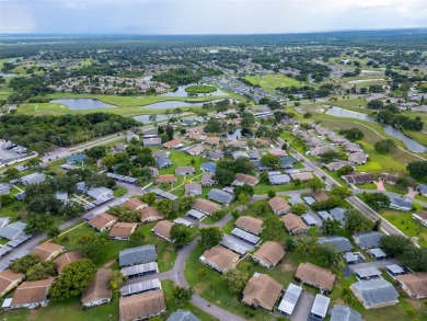 One or more photo(s) has been virtually staged. This home was on Kings Point Executive Golf Course in Florida - for sale on GolfHomes.com, golf home, golf lot