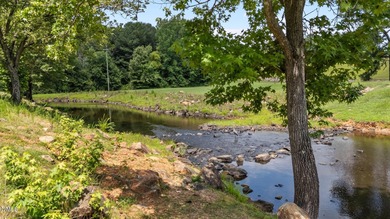 Discover the perfect place to build your dream home inside the on River Golf and Country Club at Lake Royale in North Carolina - for sale on GolfHomes.com, golf home, golf lot