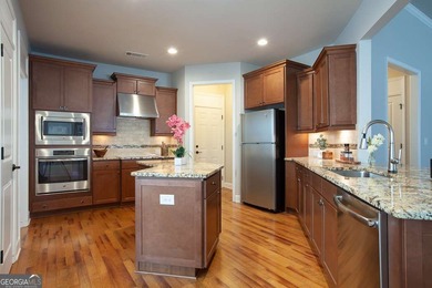 First time to market, this custom designed MAPLE floor plan has on Lanier Island Legacy Golf Couorse in Georgia - for sale on GolfHomes.com, golf home, golf lot