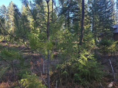 Wooded building lot in Western Montana. Lots is located in an on Trestle Creek Golf Course in Montana - for sale on GolfHomes.com, golf home, golf lot