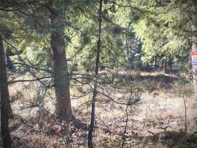 Wooded building lot in Western Montana. Lots is located in an on Trestle Creek Golf Course in Montana - for sale on GolfHomes.com, golf home, golf lot