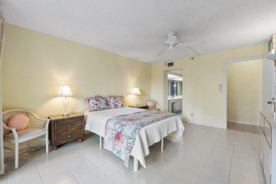 Welcome home to this beautifully maintained first-floor condo on The Country Club At Boca Raton in Florida - for sale on GolfHomes.com, golf home, golf lot