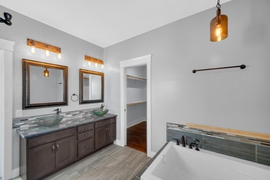 Offering nearly 4,500 finished square feet, this impressive on Sandy Pines Golf Course in Indiana - for sale on GolfHomes.com, golf home, golf lot