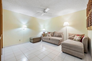 Welcome home to this beautifully maintained first-floor condo on The Country Club At Boca Raton in Florida - for sale on GolfHomes.com, golf home, golf lot