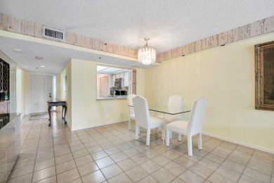 Welcome home to this beautifully maintained first-floor condo on The Country Club At Boca Raton in Florida - for sale on GolfHomes.com, golf home, golf lot