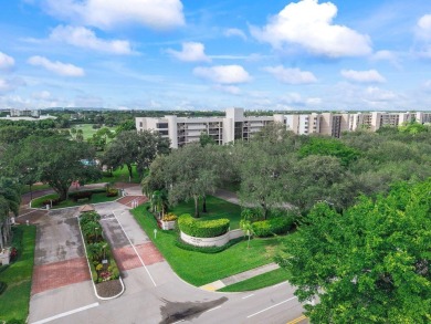 Welcome home to this beautifully maintained first-floor condo on The Country Club At Boca Raton in Florida - for sale on GolfHomes.com, golf home, golf lot