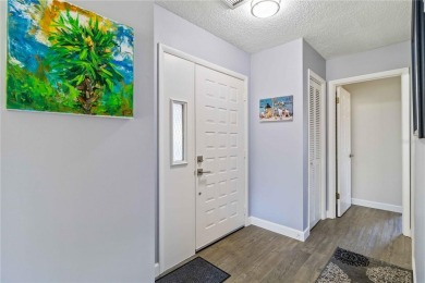 Offering a beautifully renovated turnkey two-bedroom, two-bath on Jacaranda West Country Club in Florida - for sale on GolfHomes.com, golf home, golf lot