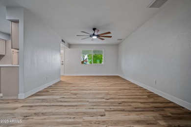 Welcome to a beautifully updated home just minutes from the on  in Arizona - for sale on GolfHomes.com, golf home, golf lot