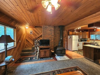 Cute as a button cabin in a great in town location! This 3 on McCall Municipal Golf Course in Idaho - for sale on GolfHomes.com, golf home, golf lot