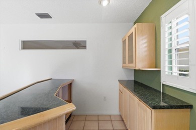 PRICED TO SELL!  A 2,390 SQ FOOT POOL HOME WITH A VIEW OF THE on Glen Lakes Country Club in Florida - for sale on GolfHomes.com, golf home, golf lot