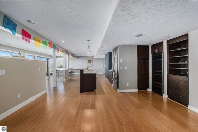 Private Luxury Estate with Panoramic Bay Views in Gated on Lochen Heath Golf Course in Michigan - for sale on GolfHomes.com, golf home, golf lot