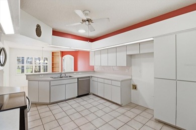 PRICED TO SELL!  A 2,390 SQ FOOT POOL HOME WITH A VIEW OF THE on Glen Lakes Country Club in Florida - for sale on GolfHomes.com, golf home, golf lot