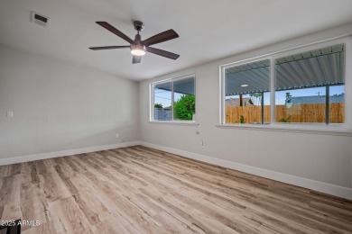 Welcome to a beautifully updated home just minutes from the on  in Arizona - for sale on GolfHomes.com, golf home, golf lot