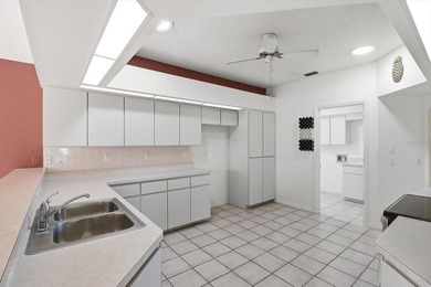 PRICED TO SELL!  A 2,390 SQ FOOT POOL HOME WITH A VIEW OF THE on Glen Lakes Country Club in Florida - for sale on GolfHomes.com, golf home, golf lot