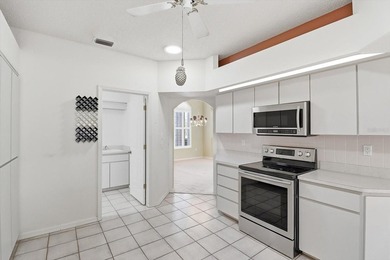 PRICED TO SELL!  A 2,390 SQ FOOT POOL HOME WITH A VIEW OF THE on Glen Lakes Country Club in Florida - for sale on GolfHomes.com, golf home, golf lot