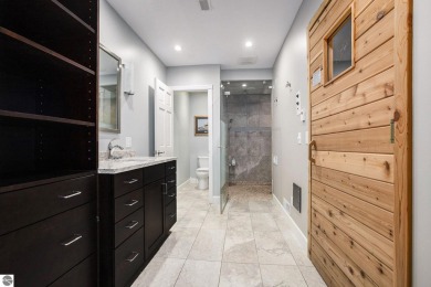 Private Luxury Estate with Panoramic Bay Views in Gated on Lochen Heath Golf Course in Michigan - for sale on GolfHomes.com, golf home, golf lot