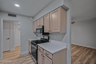 Welcome to a beautifully updated home just minutes from the on  in Arizona - for sale on GolfHomes.com, golf home, golf lot