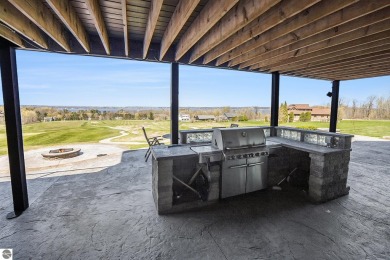 Private Luxury Estate with Panoramic Bay Views in Gated on Lochen Heath Golf Course in Michigan - for sale on GolfHomes.com, golf home, golf lot