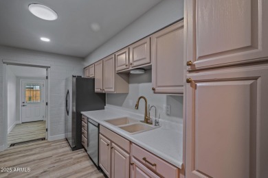 Welcome to a beautifully updated home just minutes from the on  in Arizona - for sale on GolfHomes.com, golf home, golf lot